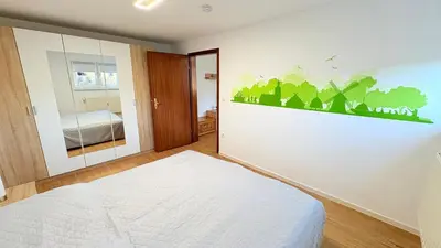 Ein Bett oder Betten in einem Zimmer der Unterkunft Lutkistube in Lübben