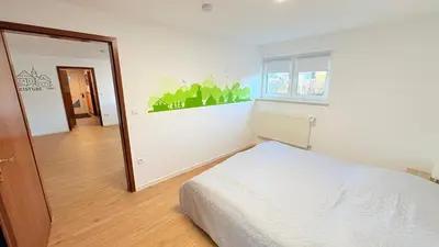Ein Bett oder Betten in einem Zimmer der Unterkunft Lutkistube in Lübben