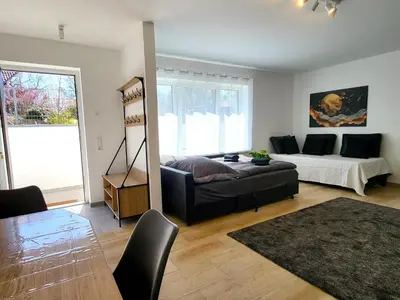 Ein Bett oder Betten in einem Zimmer der Unterkunft Apartment 1Zi Villa Asih