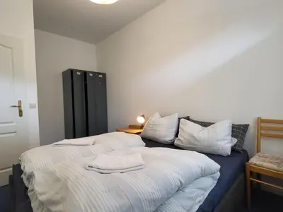 Ein Bett oder Betten in einem Zimmer der Unterkunft Apartment Terrassenwohnung am See by Interhome