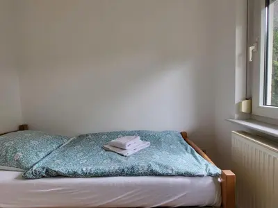 Ein Bett oder Betten in einem Zimmer der Unterkunft Apartment Terrassenwohnung am See by Interhome