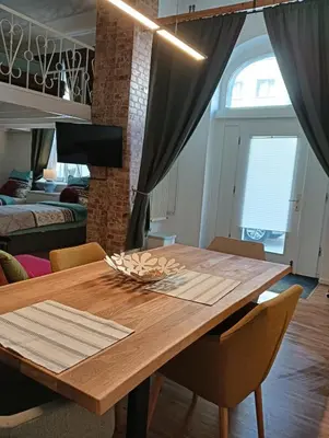 Ein Bett oder Betten in einem Zimmer der Unterkunft Studio Apartments Alfred