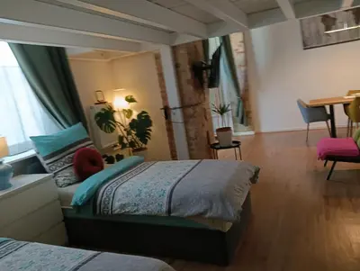 Ein Bett oder Betten in einem Zimmer der Unterkunft Studio Apartments Alfred