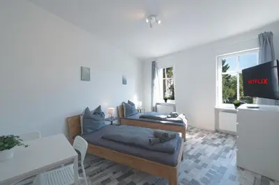 TV/Unterhaltungsangebot in der Unterkunft Urbanes Dachrefugium mit Balkon