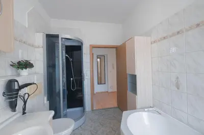 Ein Badezimmer in der Unterkunft Urbanes Dachrefugium mit Balkon