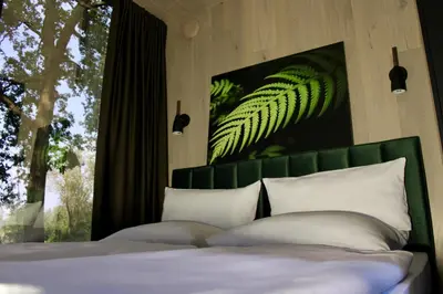 Ein Bett oder Betten in einem Zimmer der Unterkunft Caravanserei Resort Oberhavel