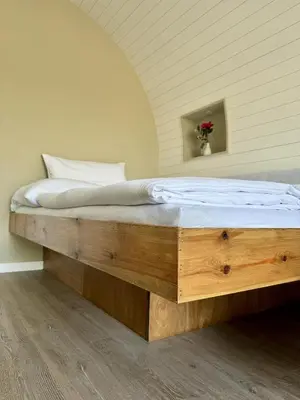Ein Bett oder Betten in einem Zimmer der Unterkunft Caravanserei Resort Oberhavel