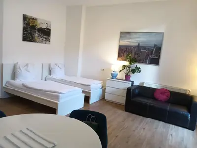 Ein Bett oder Betten in einem Zimmer der Unterkunft AF Apartments Studio Berlin