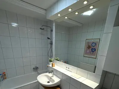 Ein Badezimmer in der Unterkunft Ferienwohnung Weidenkörbchen am Wasser in Werder Havel