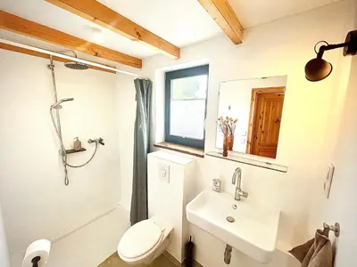 Ein Badezimmer in der Unterkunft 