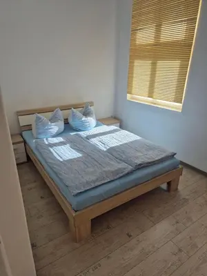 Ein Bett oder Betten in einem Zimmer der Unterkunft Haus am Wendsee