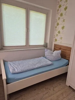 Ein Bett oder Betten in einem Zimmer der Unterkunft Haus am Wendsee