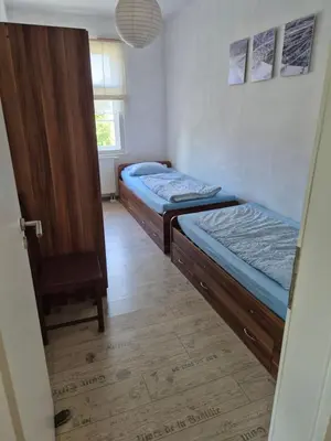 Ein Bett oder Betten in einem Zimmer der Unterkunft Haus am Wendsee