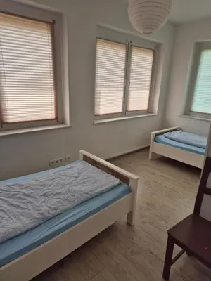 Ein Bett oder Betten in einem Zimmer der Unterkunft Haus am Wendsee