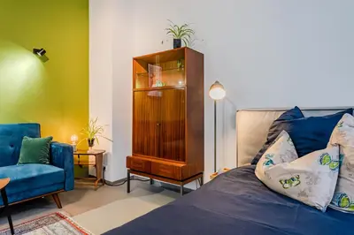 Ein Bett oder Betten in einem Zimmer der Unterkunft La Maisonnette - le petit appart
