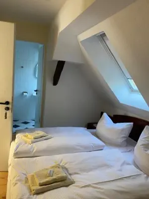 Ein Bett oder Betten in einem Zimmer der Unterkunft Landgasthaus Jahnsfelde
