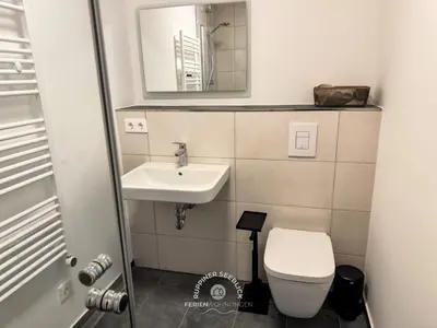 Ein Badezimmer in der Unterkunft Ruppiner Seeblick Ferienwohnungen