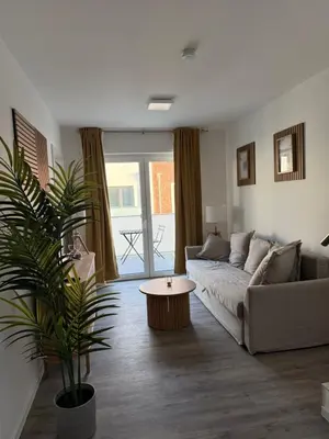 Ein Sitzbereich in der Unterkunft Ferienwohnung Sonnenufer Residenz am See in Neuruppin