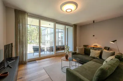 Ein Sitzbereich in der Unterkunft Marina Apartment am See mit Pool und Sauna