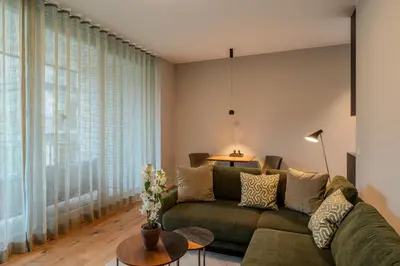 Ein Sitzbereich in der Unterkunft Marina Apartment am See mit Pool und Sauna