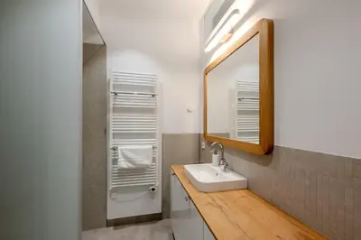 Ein Badezimmer in der Unterkunft Marina Apartment am See mit Pool und Sauna