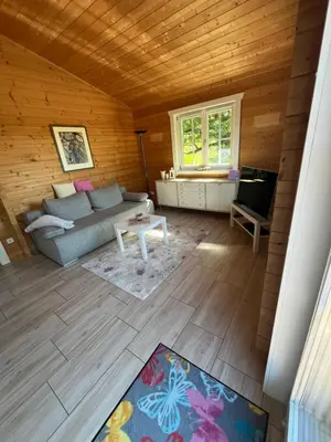 Ein Sitzbereich in der Unterkunft Silence-Lodge