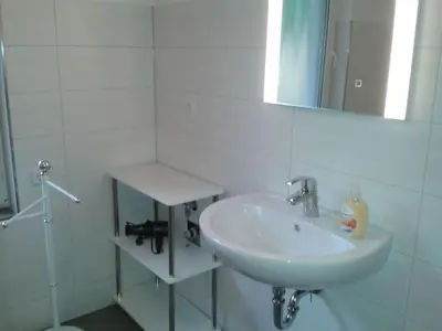 Ein Badezimmer in der Unterkunft Holiday apartment on Grimnitzsee