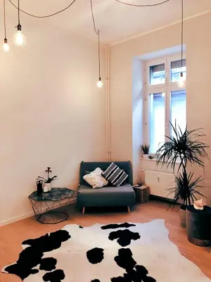 Ein Sitzbereich in der Unterkunft Designer open plan apartment Friedrichshain