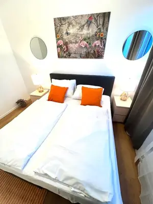 Ein Bett oder Betten in einem Zimmer der Unterkunft BIG New 7Rooms City Center APARTMENTS and Suites