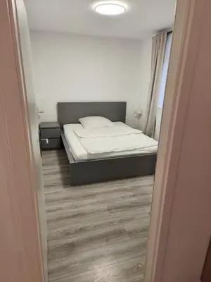 Ein Bett oder Betten in einem Zimmer der Unterkunft FeWo am Straussee in Strausberg