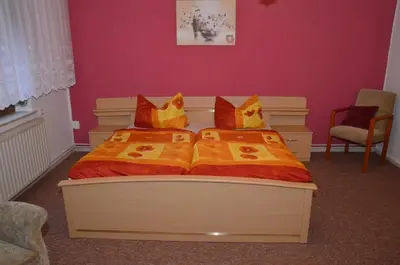 Ein Bett oder Betten in einem Zimmer der Unterkunft Ferienwohnung Wunderlich