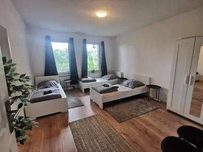 Ein Bett oder Betten in einem Zimmer der Unterkunft Apartmenthaus in Rüdersdorf