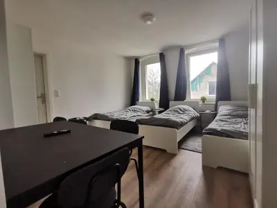 Ein Bett oder Betten in einem Zimmer der Unterkunft Apartmenthaus in Rüdersdorf