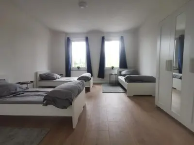 Ein Bett oder Betten in einem Zimmer der Unterkunft Apartmenthaus in Rüdersdorf