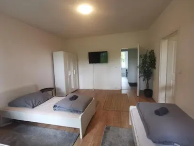 Ein Bett oder Betten in einem Zimmer der Unterkunft Apartmenthaus in Rüdersdorf