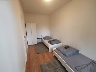 Ein Bett oder Betten in einem Zimmer der Unterkunft Apartmenthaus in Rüdersdorf