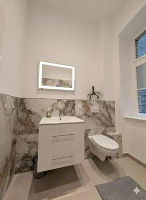 Ein Badezimmer in der Unterkunft Stylisches City-Apartment High End