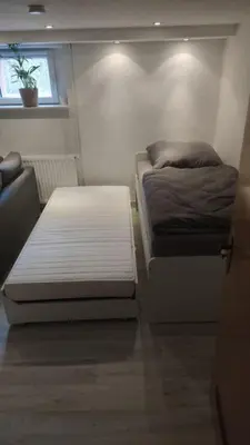 Ein Bett oder Betten in einem Zimmer der Unterkunft Ferienwohnung, Apartment, Pension - Berlin Neuenhagen
