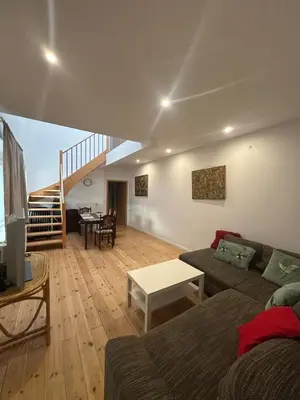 Ein Sitzbereich in der Unterkunft Nice apartment in Berlin7