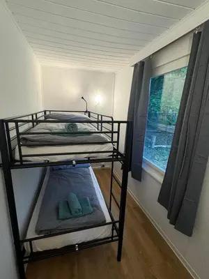 Ein Bett oder Betten in einem Zimmer der Unterkunft Bungalowdorf Seddiner See - Bungalow 9