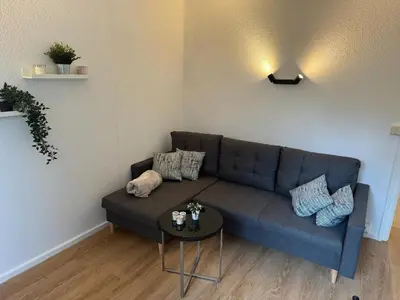Ein Sitzbereich in der Unterkunft Bungalowdorf Seddiner See - Bungalow 9