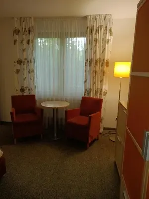 Ein Sitzbereich in der Unterkunft Pension Am Seeberg