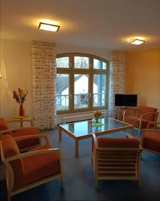 Ein Sitzbereich in der Unterkunft Pension Am Seeberg