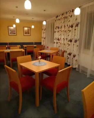 Ein Sitzbereich in der Unterkunft Pension Am Seeberg