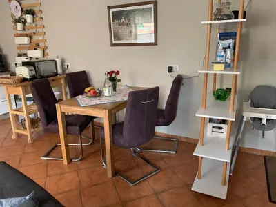Ein Sitzbereich in der Unterkunft Olivia