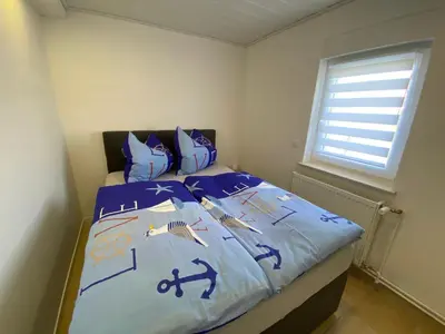 Ein Bett oder Betten in einem Zimmer der Unterkunft Beetzseeperle