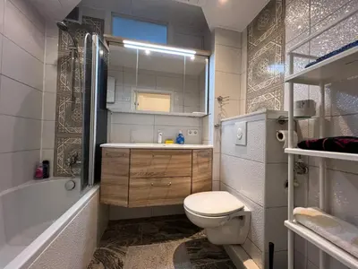 Ein Badezimmer in der Unterkunft LuxusCityApartment