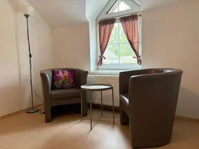 Ein Sitzbereich in der Unterkunft Ferienwohnung Seeglück - 4 Schlaf- & 4 Badezimmer