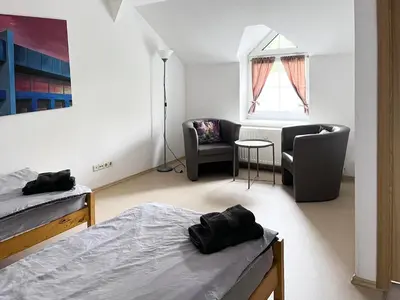 Ein Bett oder Betten in einem Zimmer der Unterkunft Ferienwohnung Seeglück - 4 Schlaf- & 4 Badezimmer