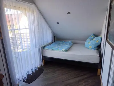 Ein Bett oder Betten in einem Zimmer der Unterkunft Krämer-Bude